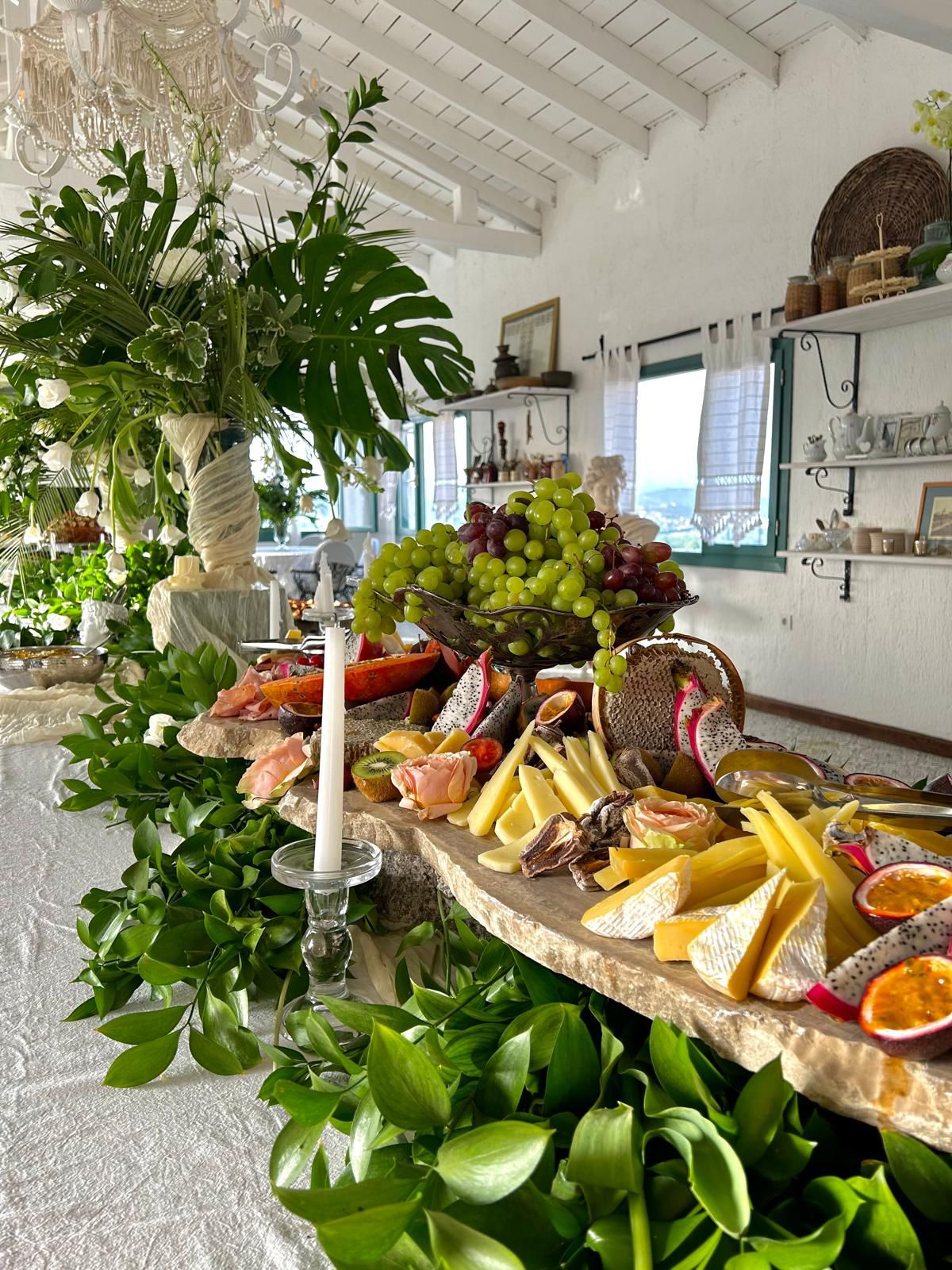 Grazing table indoors with greenery