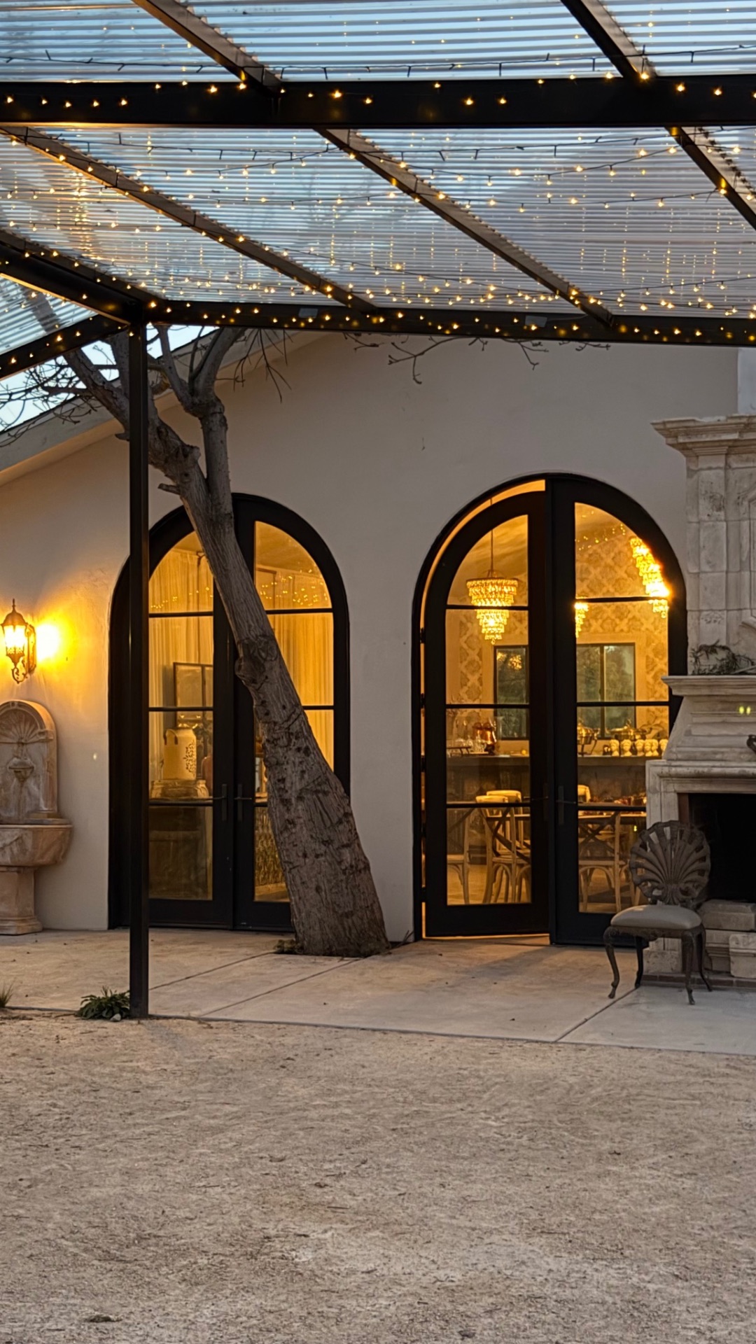 Estate arches under evening lights