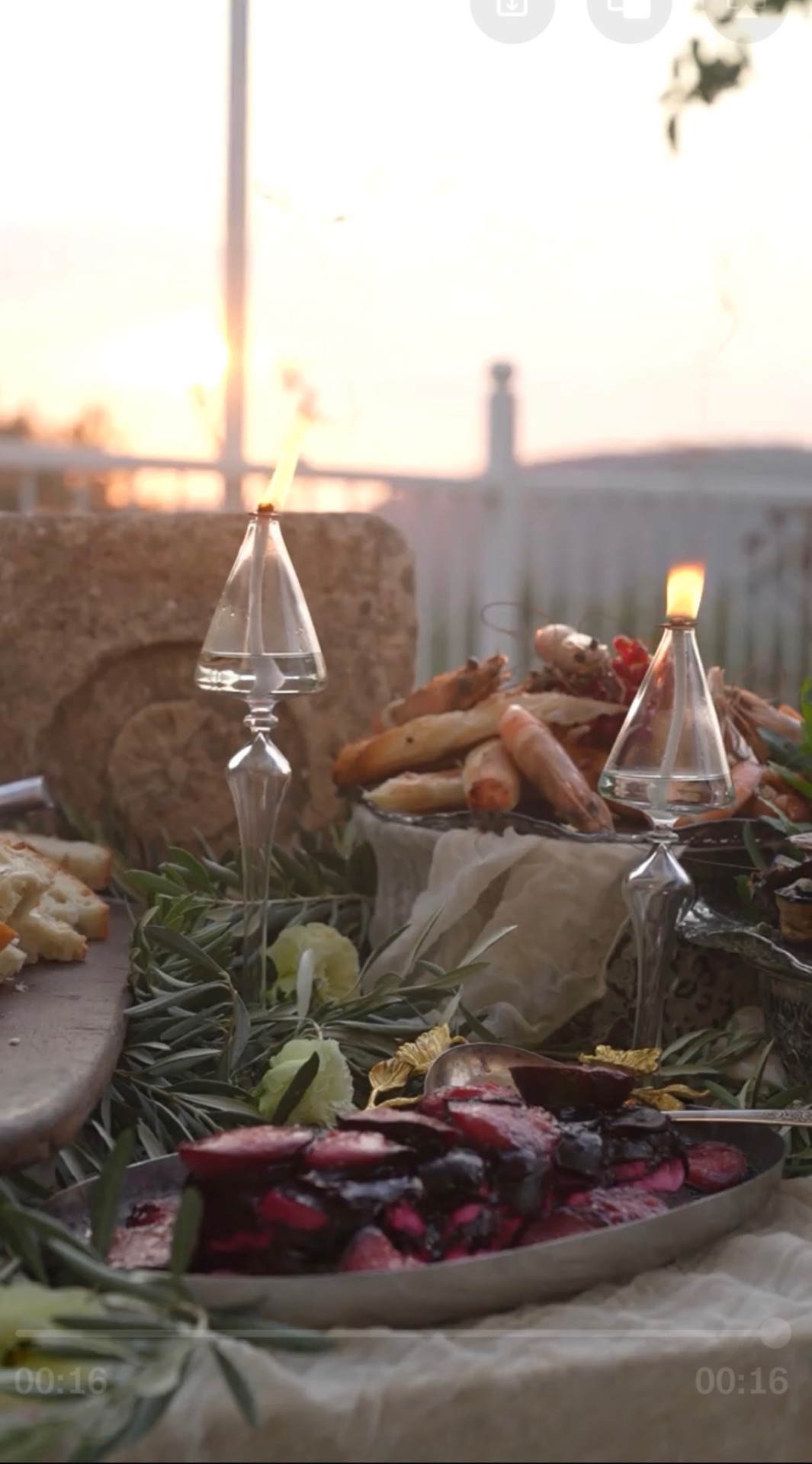 Glowing oil lamps at sunset